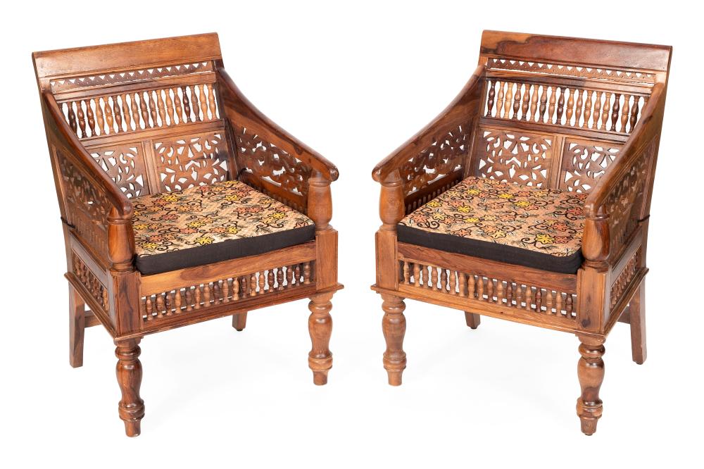 Appraisal: PAIR OF INDO-PERSIAN TEAK ARMCHAIRS TH CENTURY BACK HEIGHTS SEAT