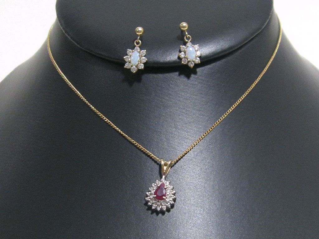 Appraisal: Lot comprising ct gold mounted ruby and diamond cluster pendant