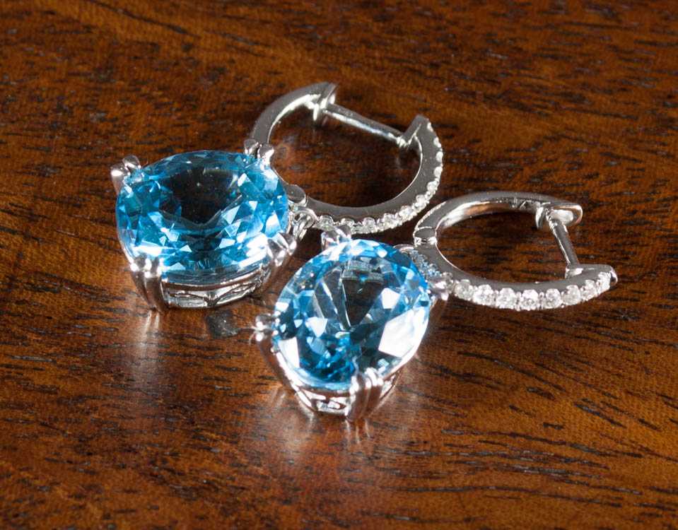 Appraisal: PAIR OF BLUE TOPAZ AND DIAMOND EARRINGS each k white