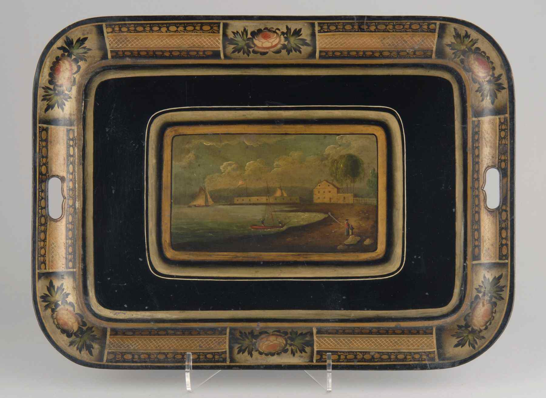 Appraisal: ANTIQUE AMERICAN TOLE TRAY th CenturyWith central hand-painted shore scene