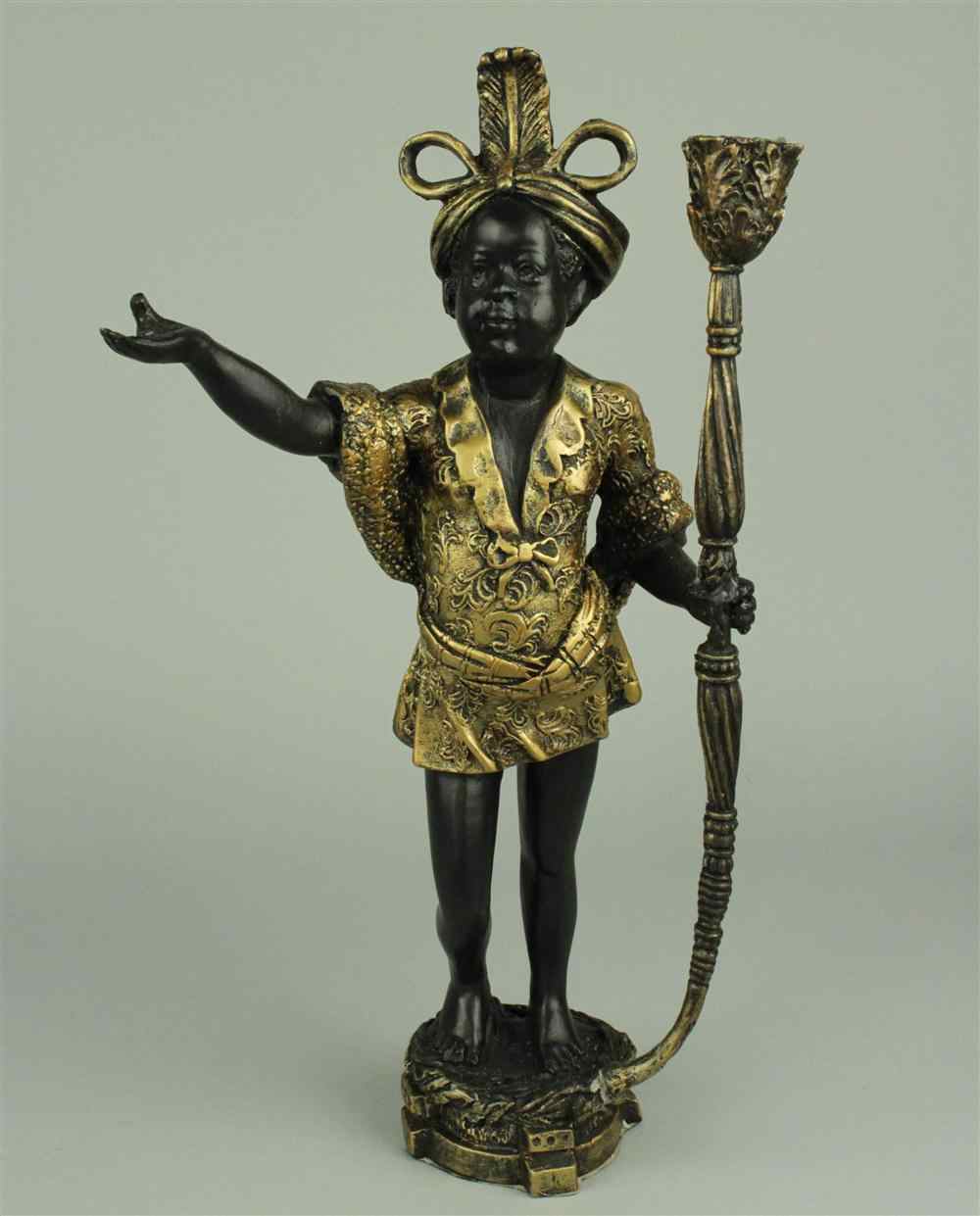 Appraisal: CAST RESIN FIGURE OF A BLACKAMOOR WITH CANDLESTICK LOT WITH