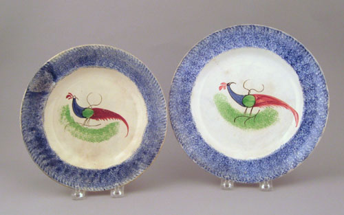 Appraisal: Two blue spatter plates th c with peafowl dia and