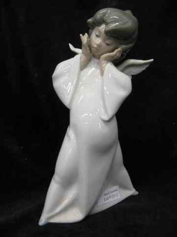 Appraisal: Lladro Porcelain Figurine of an Angel ''Cherub Puzzled'' '' excellent