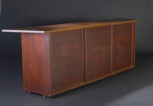 Appraisal: GEORGE NAKASHIMA Walnut credenza with three sliding doors enclosing four