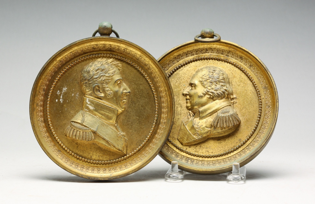 Appraisal: TWO BRASS RELIEF PORTRAIT MEDALLIONS European fourth quarter th century