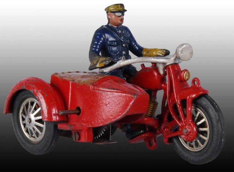 Appraisal: Rare Cast Iron Hubley Motorized Motorcycle Toy Description Demountable policeman