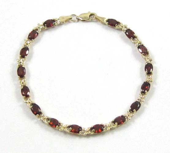 Appraisal: GARNET AND FOURTEEN KARAT GOLD BRACELET - inches in length