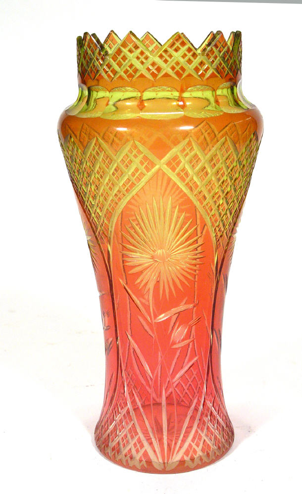 Appraisal: Cranberry and green flashed glass vase cut with flowers on