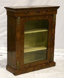 Appraisal: A Victorian walnut and inlaid pier cabinet with ormolu mounts