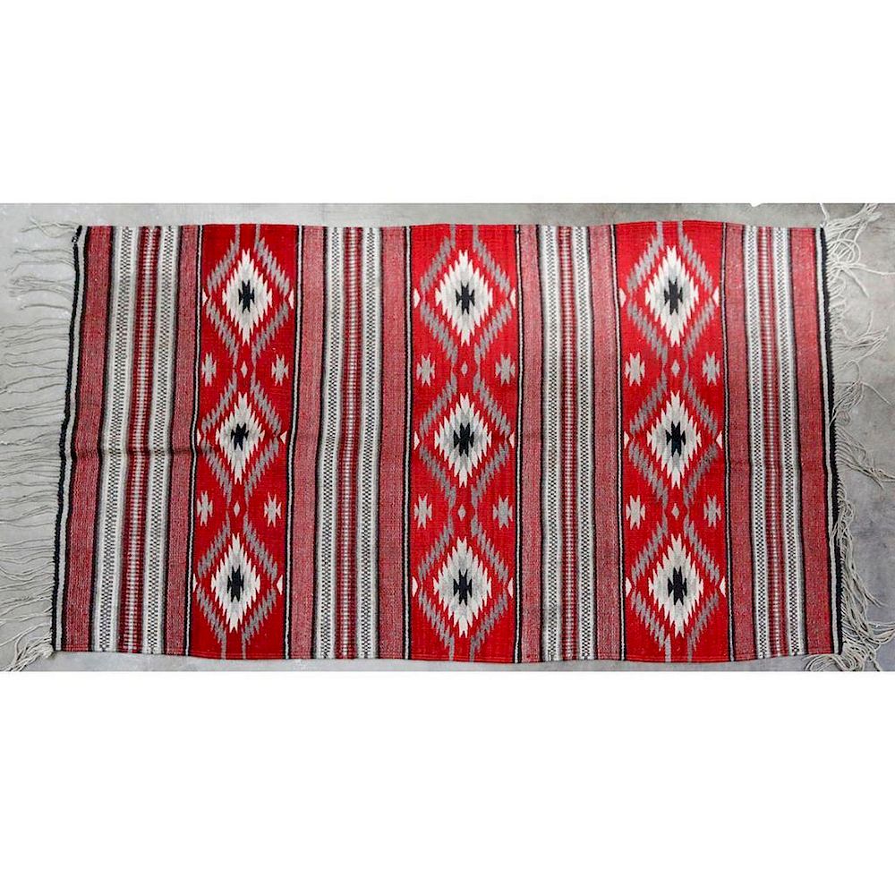 Appraisal: Mexican rug Mexican rug in a Navajo pattern Approximately x