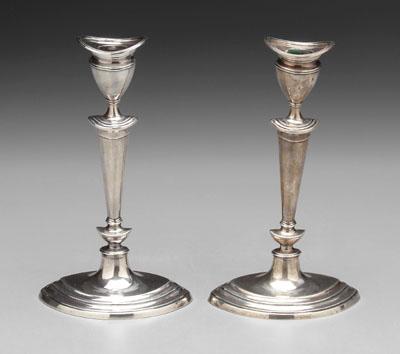 Appraisal: Pair English silver candlesticks each with oval stepped base with