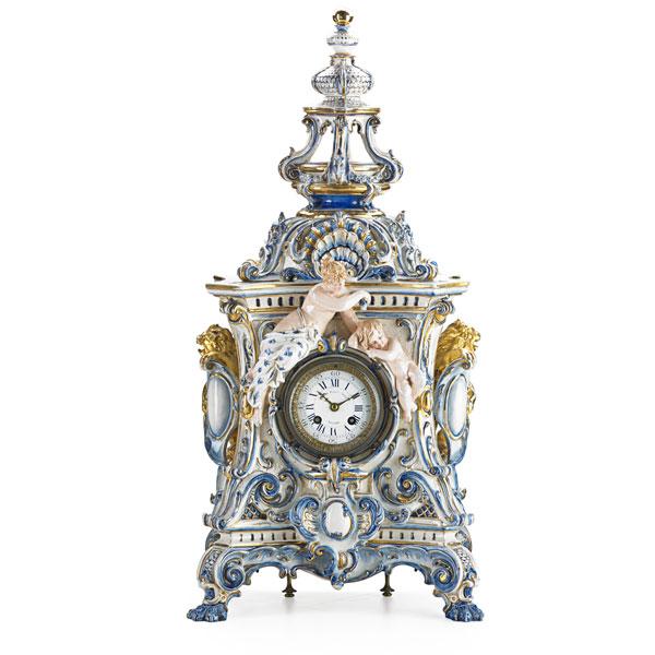 Appraisal: PORCELAIN MANTLE CLOCK Cherub figural design in the Meissen style