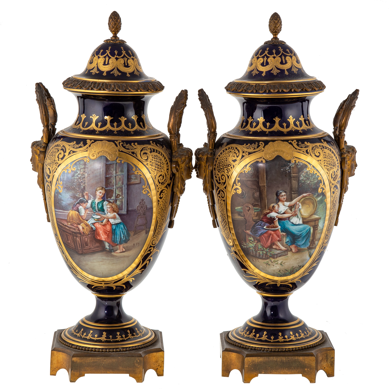 Appraisal: A PAIR OF BLEU DE ROIS MOUNTED URNS In the