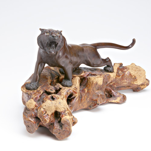 Appraisal: JAPANESE BRONZE Okimono of a tiger striding pose and snarling