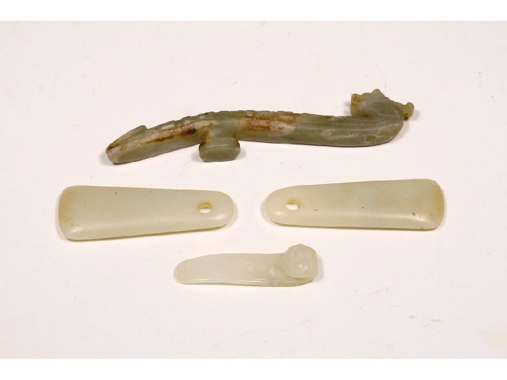 Appraisal: AN ARCHAIC-STYLE JADE BELT BUCKLE in the form of a