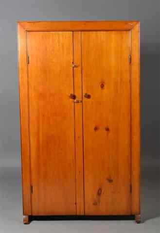 Appraisal: An American Pine Two Door CupboardWith two doors opening to