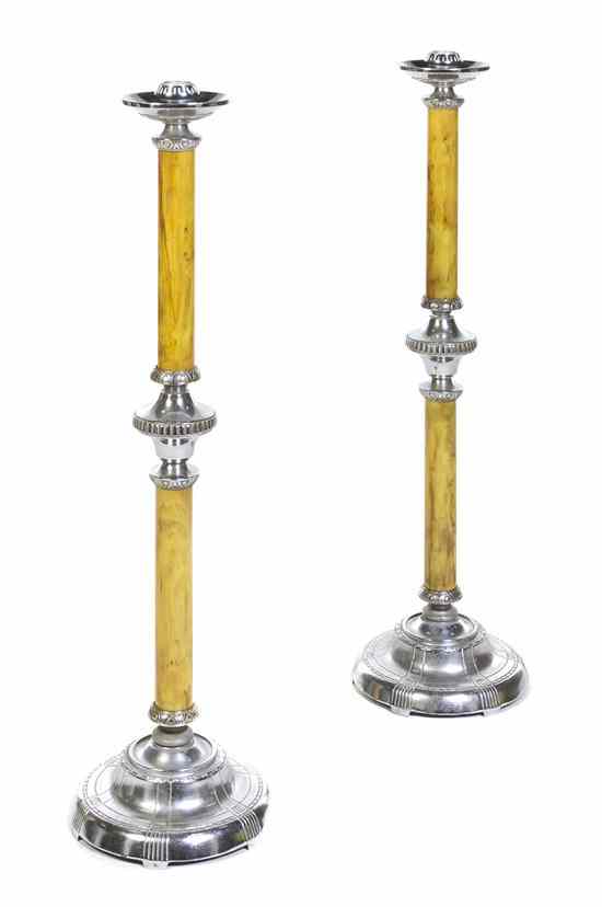 Appraisal: A Pair of Art Deco Chromed Metal Prickets each with