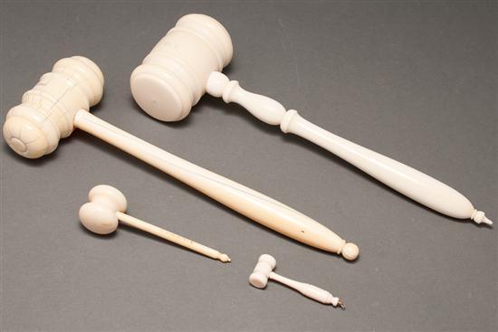 Appraisal: Two carved ivory gavels and two miniature gavels large gavels