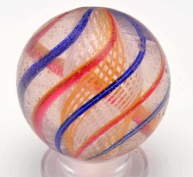 Appraisal: Bicolored Latticino Core Swirl Marble Description With alternating groups of