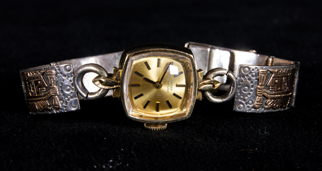 Appraisal: GIRARD PEREGAUX K GOLD AND SILVER BANDED WATCH WITH AZTEC