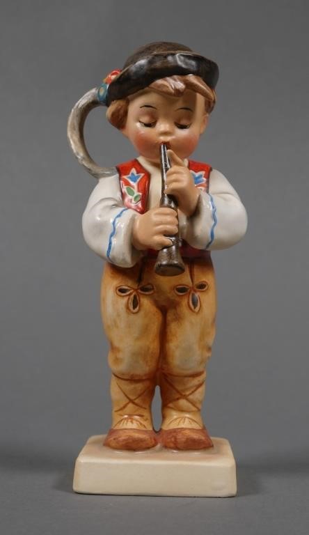 Appraisal: International Hummel Slovakian boy playing horn Figurine has hollow base