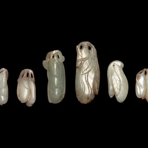 Appraisal: Six Chinese Carved Jade Beans each of elongated form carved