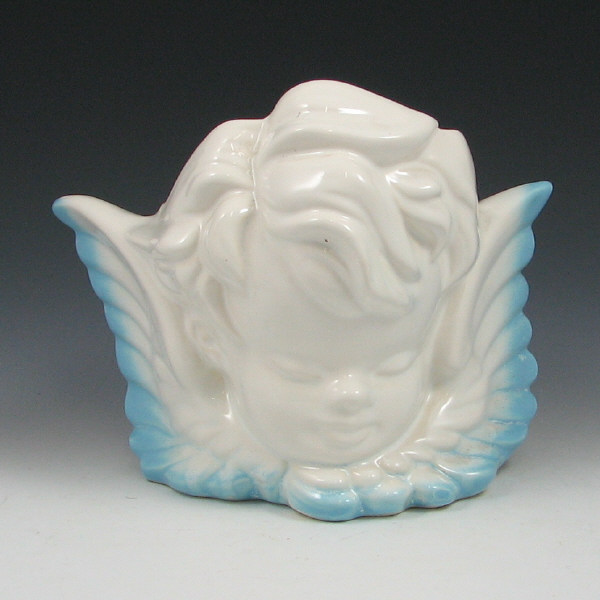 Appraisal: Hull Novelty Winged Cherub Planter Novelty winged cherub planter Marked