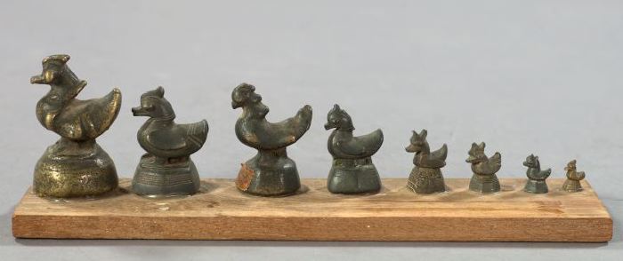 Appraisal: Graduated Set of Eight Ancient Thai Patinated Bronze Gold Weights