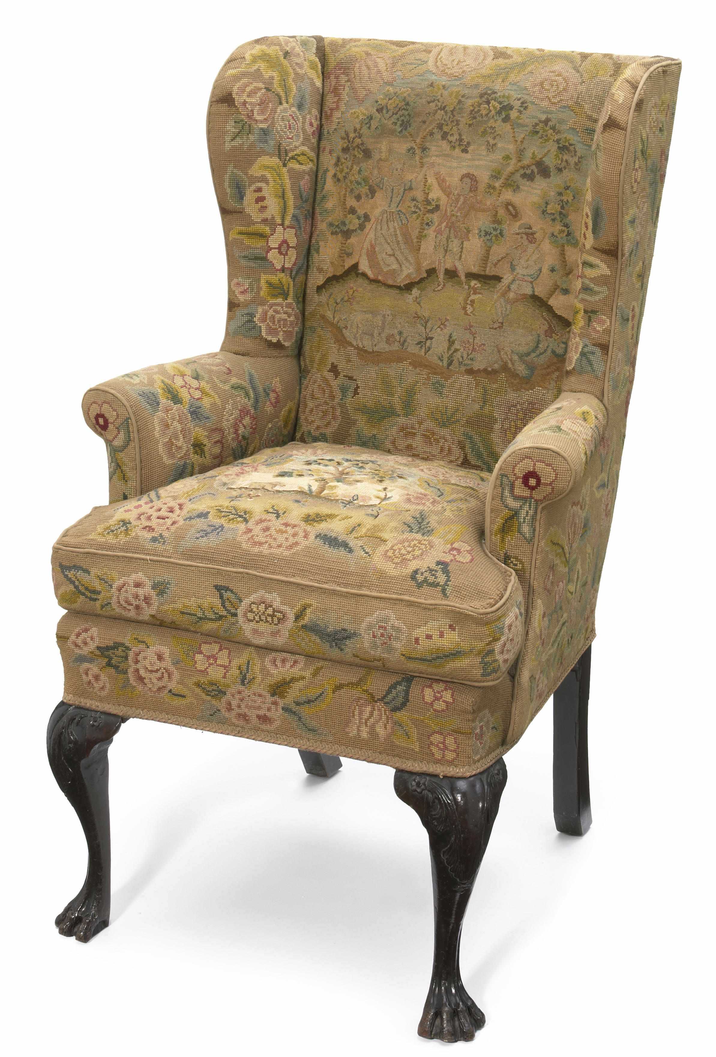 Appraisal: A George III carved mahogany wing armchair fourth quarter th