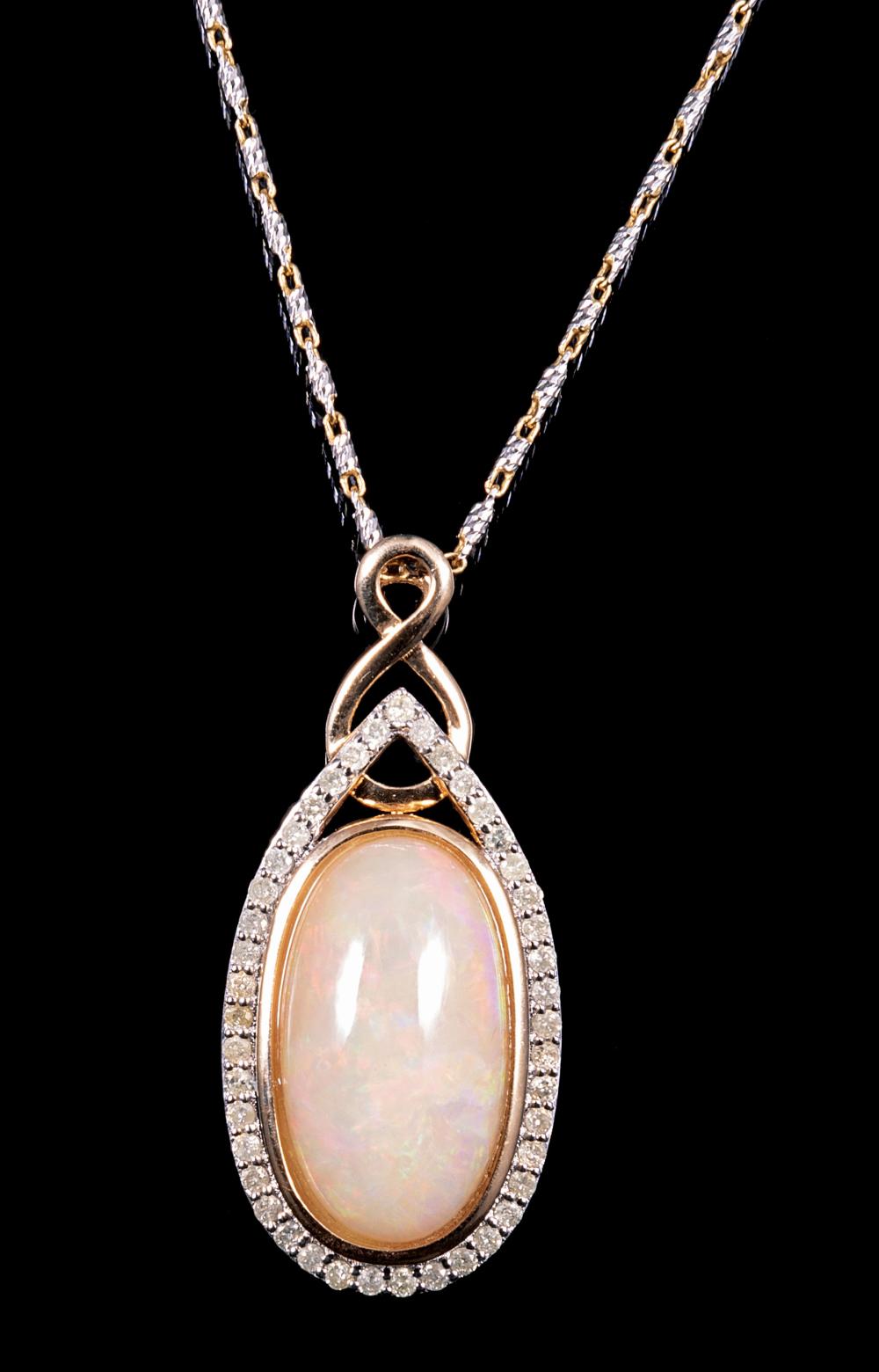 Appraisal: kt Yellow Gold Opal and Diamond Pendant with kt Yellow