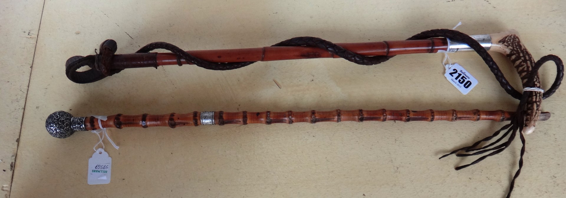 Appraisal: A Brigg riding crop with horn handle and silver collar