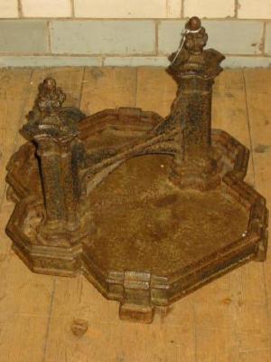 Appraisal: A VICTORIAN GOTHIC CAST IRON BOOTSCRAPER of canted oblong form