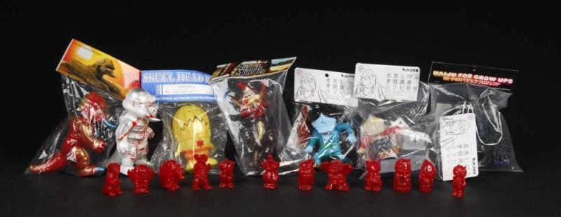 Appraisal: Large Lot of Vinyl Figures Description Japanese Rumble Monsters Sunguts