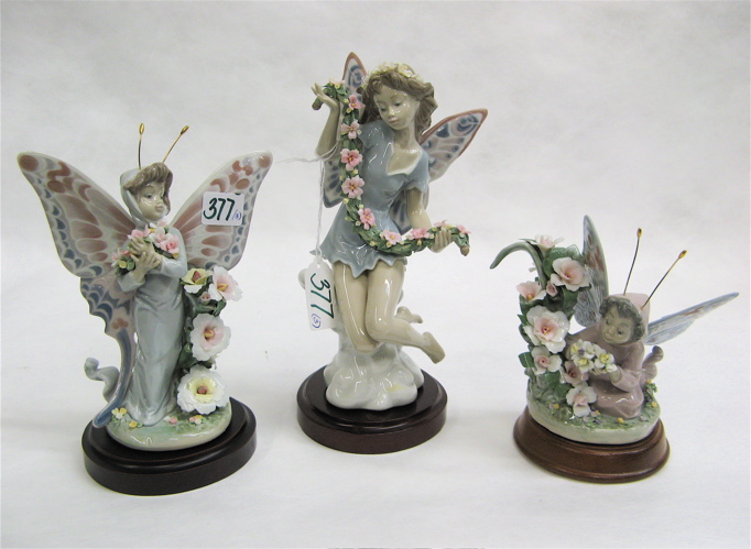 Appraisal: THREE LLADRO GLAZED PORCELAIN FIGURES Fairy Flowers - H Floral