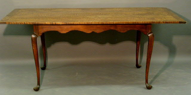 Appraisal: Queen Anne style tiger maple tavern table with a scalloped