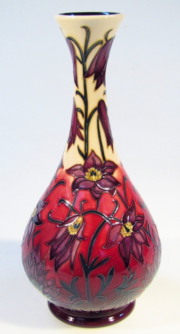 Appraisal: A Moorcroft pottery Pasque Flowers pattern vase by Phillip Gibson