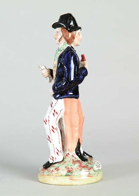 Appraisal: FINE STAFFORDSHIRE DOUBLE SIDED FIGURINE WATER-GIN Man is seen on