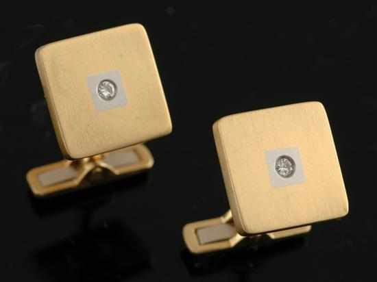 Appraisal: A pair of diamond cufflinks Each square plaque set with