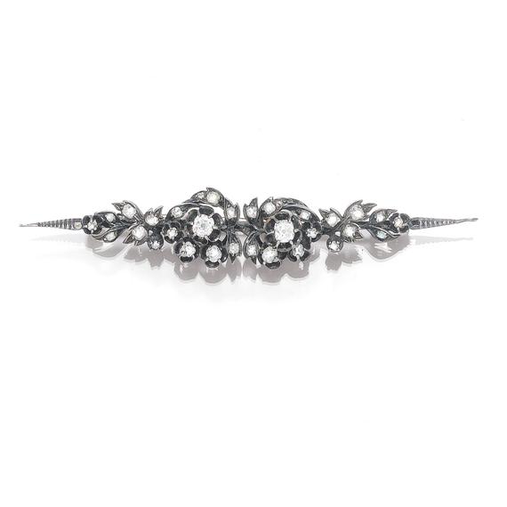 Appraisal: DIAMOND BROOCH ca Silver Very fancy bar brooch of floral