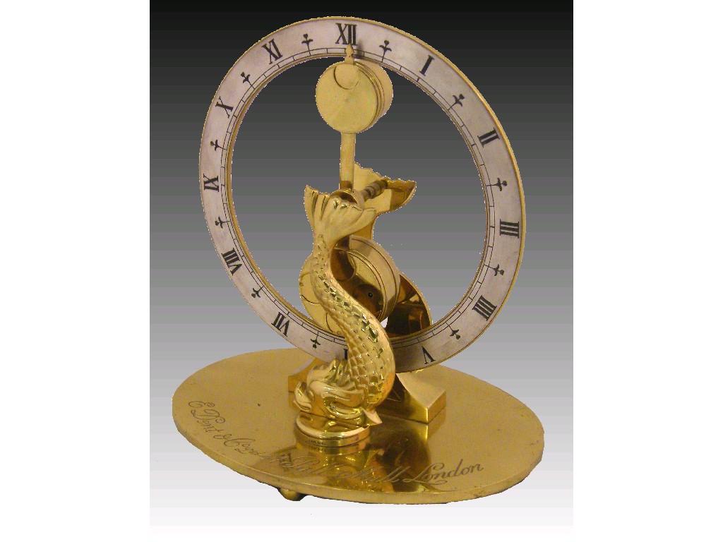 Appraisal: Contemporary E Dent Co limited edition brass mystery clock the