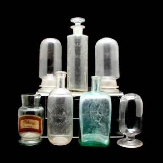 Appraisal: A Miscellaneous Group of Bottles to include three inverted counter