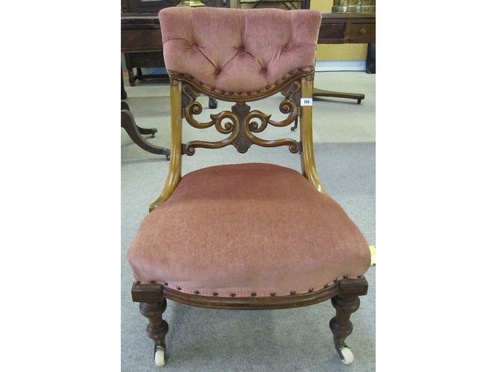 Appraisal: Victorian mahogany nursing chair upholstered in pink velour and raised