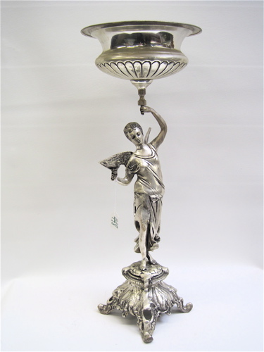 Appraisal: SILVER PLATED FIGURAL CENTERPIECE BOWL with an angel raising bowl