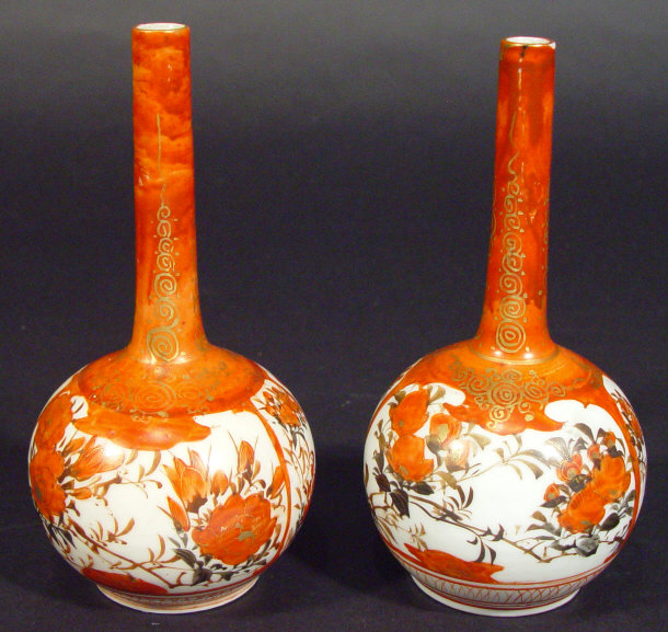 Appraisal: Pair of Japanese Kutani porcelain bottle vases painted in iron