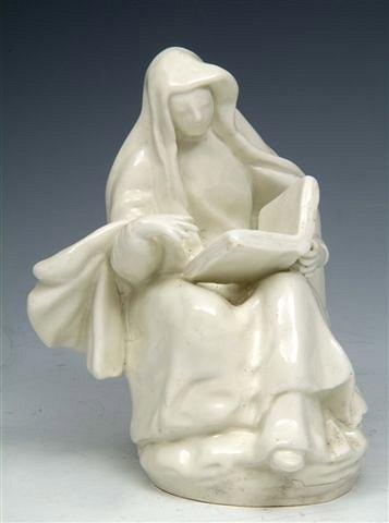 Appraisal: A RARE CHAFFER'S FIGURE of a seated nun circa repair