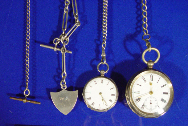 Appraisal: Gentleman's silver pocket watch on a chain ladies silver pocket