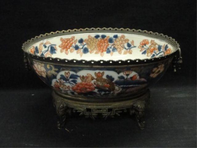 Appraisal: Imari Style Porcelain Centerpiece Mounted in gilt metal with handls