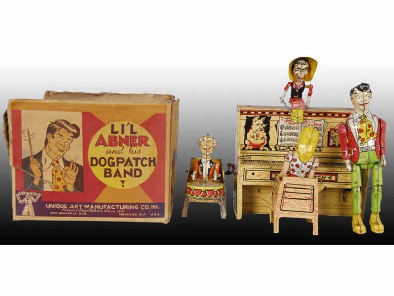 Appraisal: Tin Wind-Up Unique Art Lil Abner Band with Origina Description