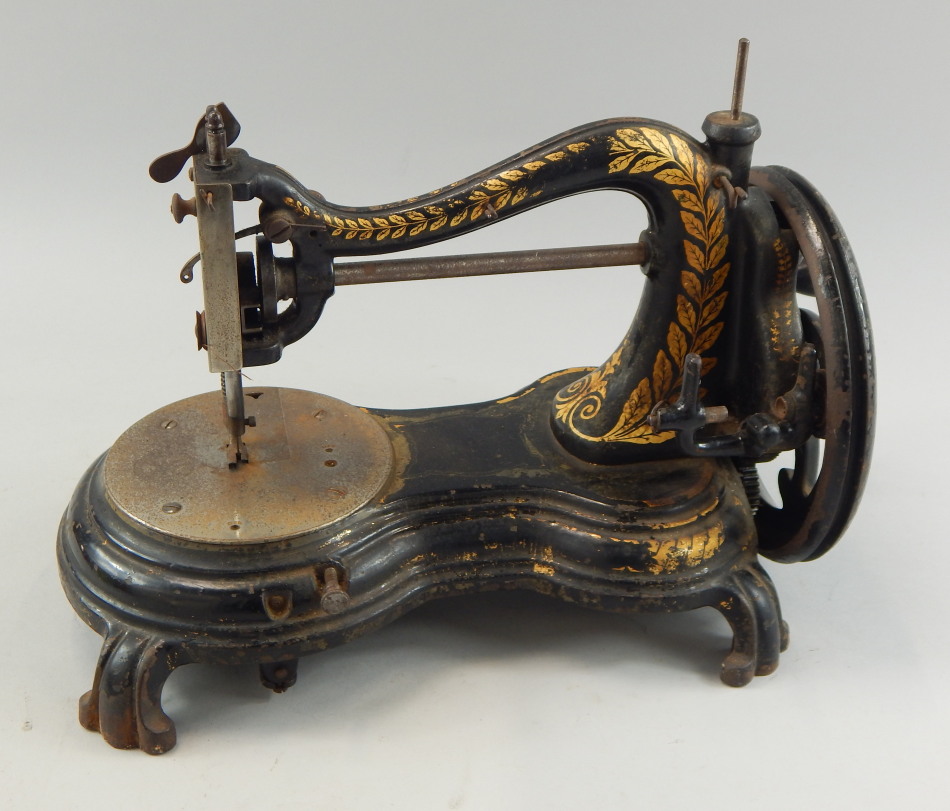 Appraisal: A Jones Co Manchester sewing machine painted black and picked