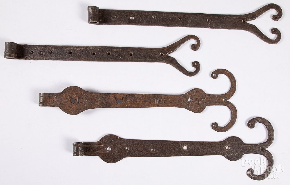 Appraisal: Two pairs of wrought iron rams horn hinges Two pairs